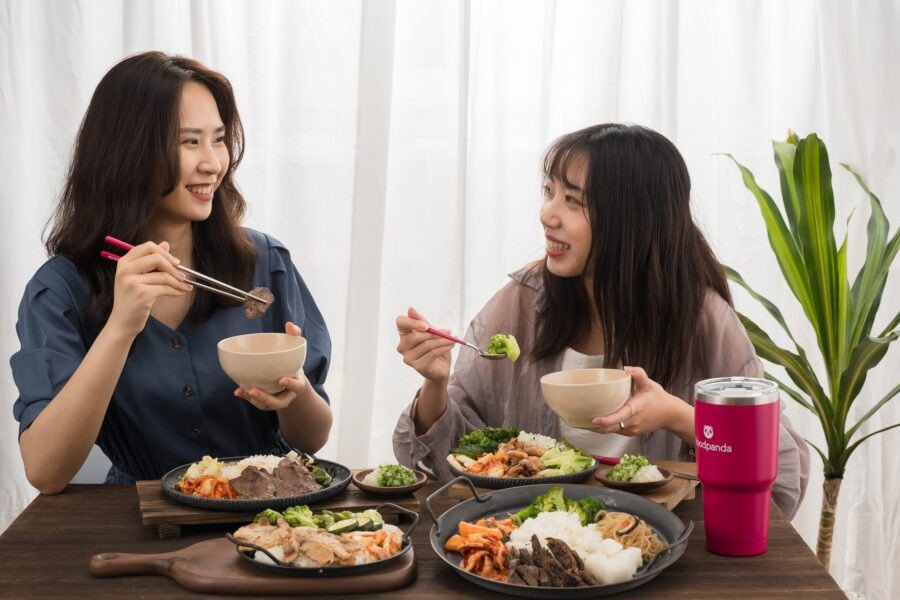 Customers enjoying a meal at a table